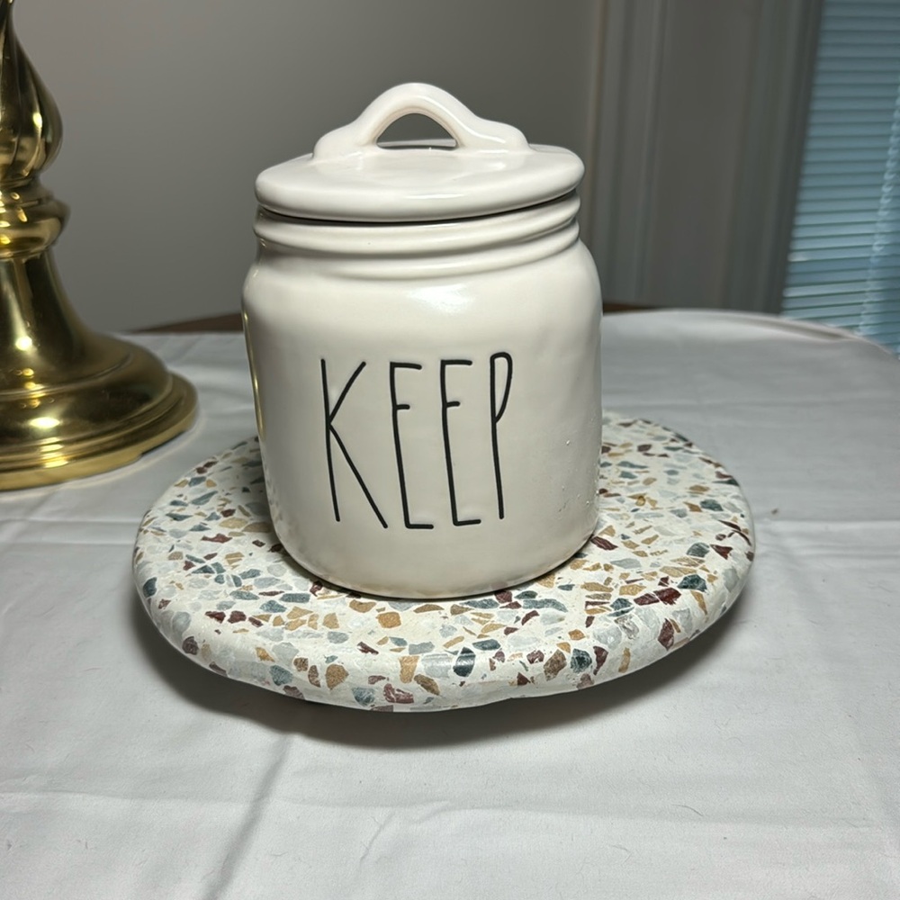 Rae Dunn small white jar with Keep on front